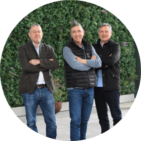 Three CODA team members standing together outside for a team photo. Meet the Events Management Team | Global Events Production | Coda Communications